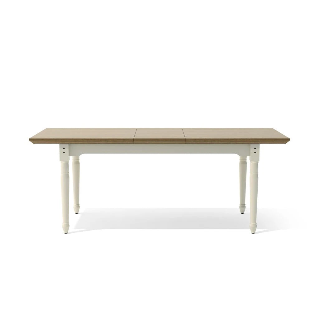 Wooden dining table with white legs on a white background