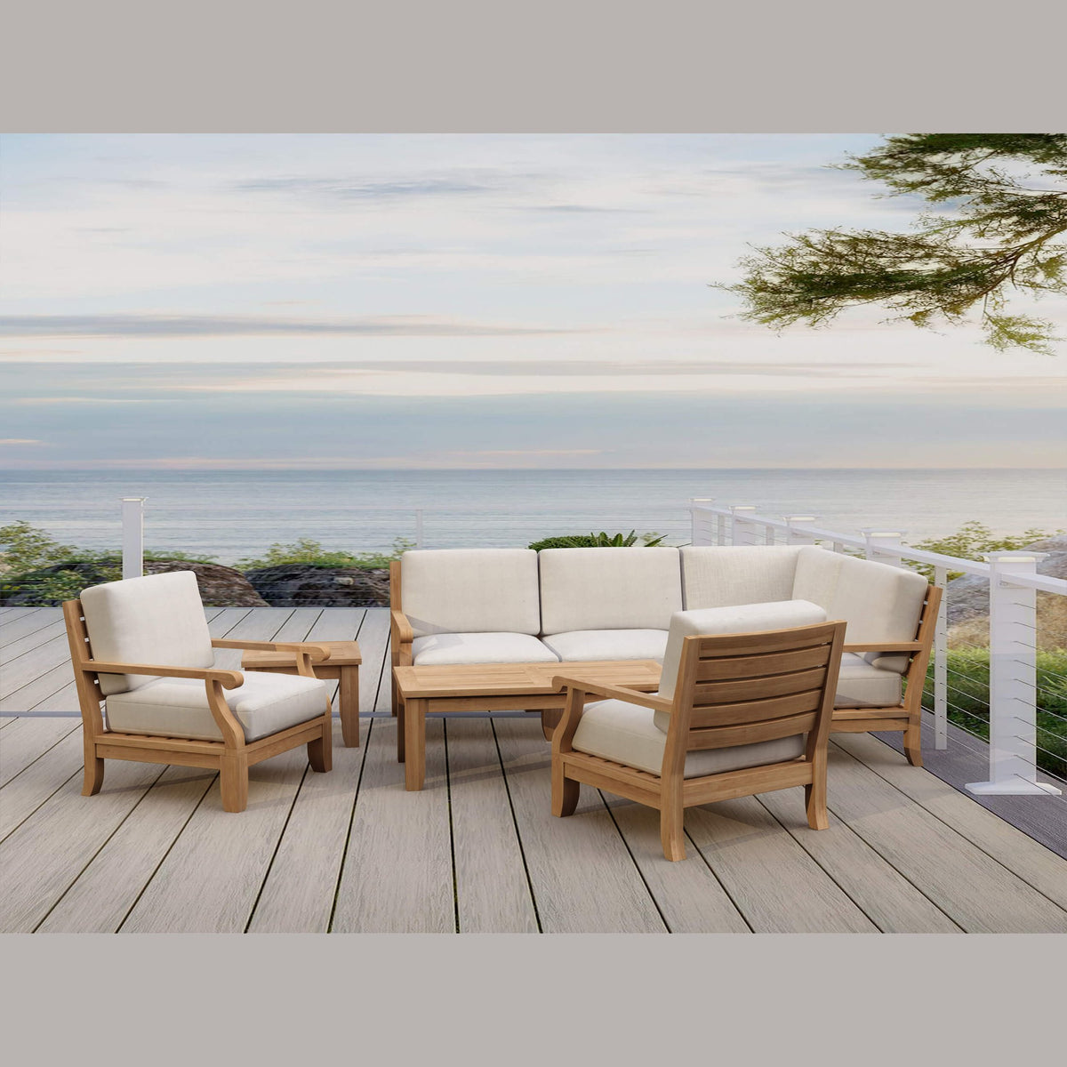 Outdoor furniture set on a deck with ocean view