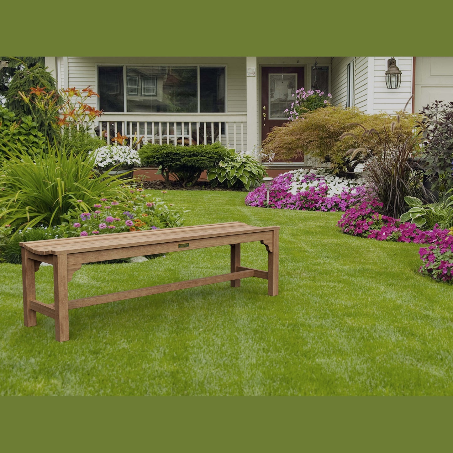 Wooden bench on a well-maintained lawn with flowers and a house in the background