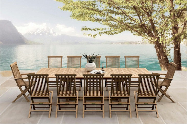 Wooden outdoor dining set with chairs by a scenic waterfront.