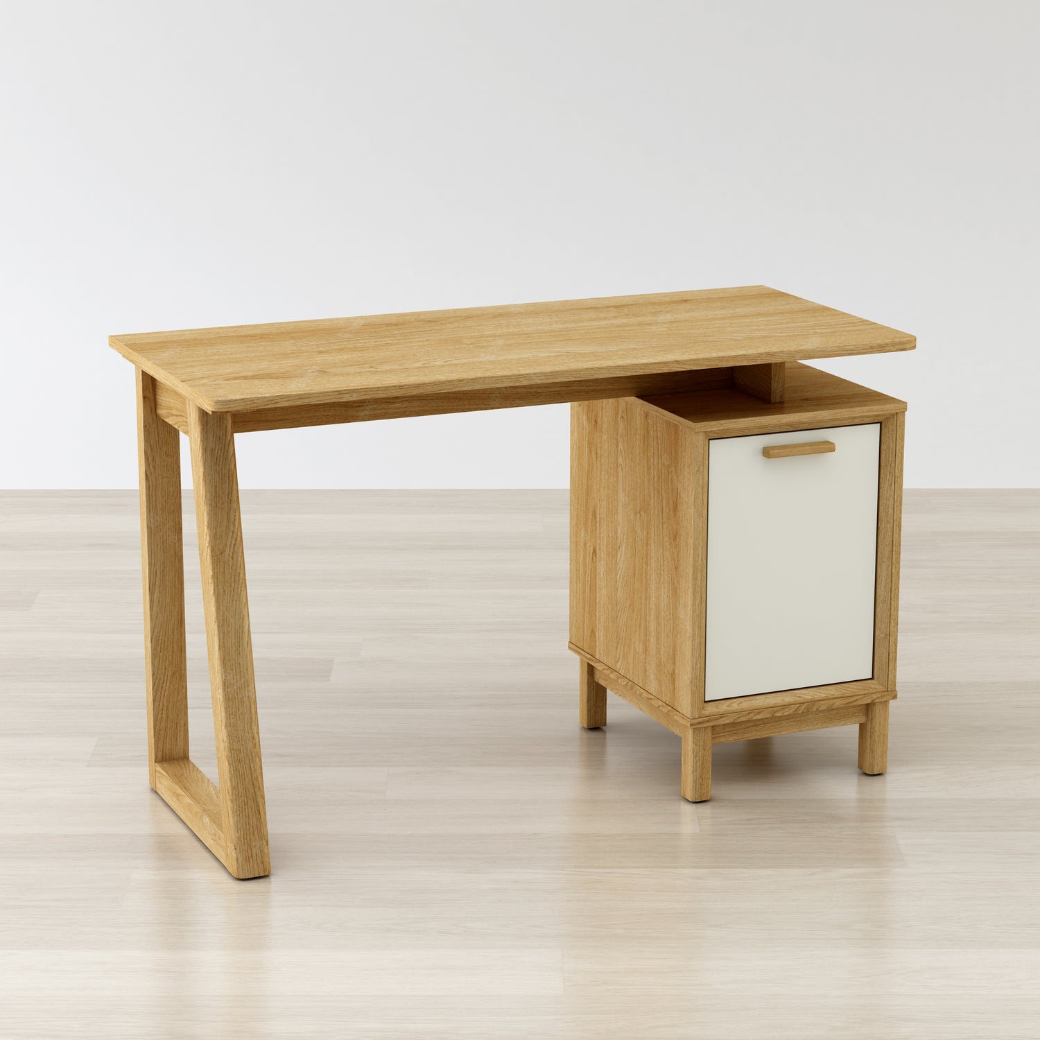 Wooden desk with a white cabinet door on a light wooden floor.