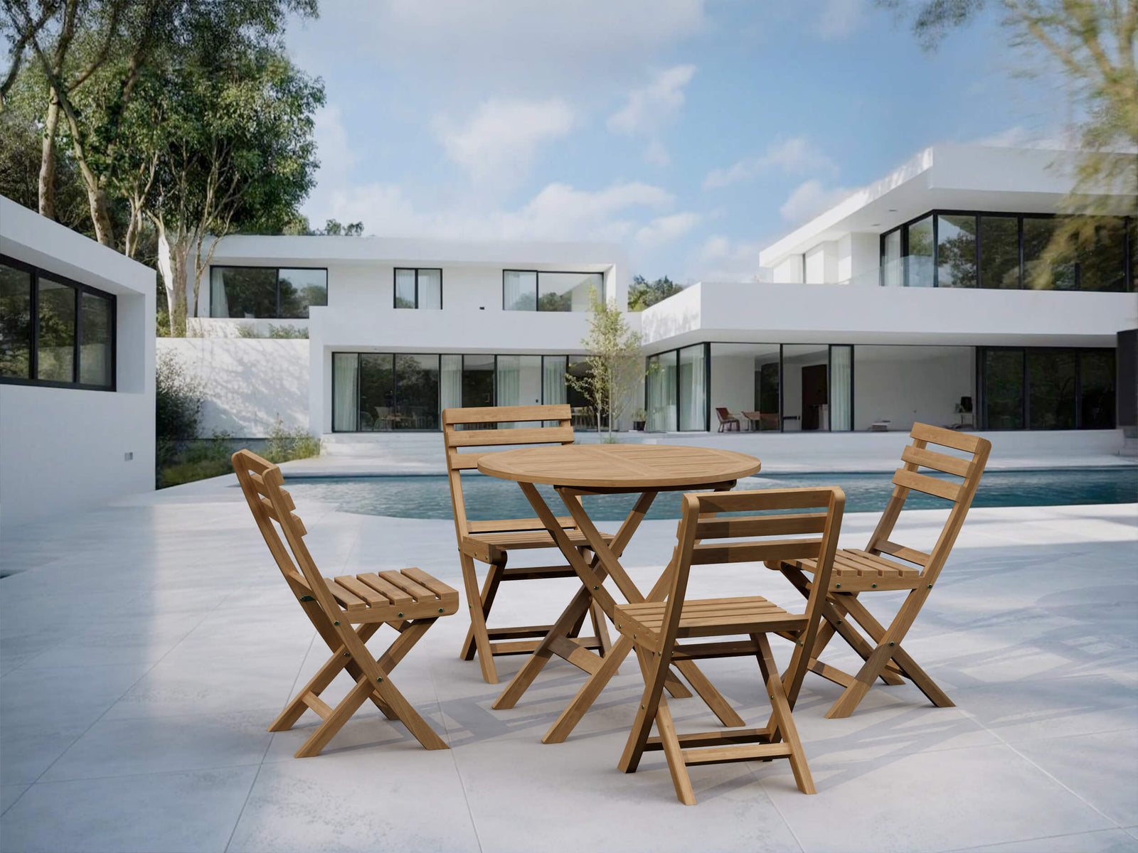 Wooden outdoor table and chairs in front of a modern house with a pool.