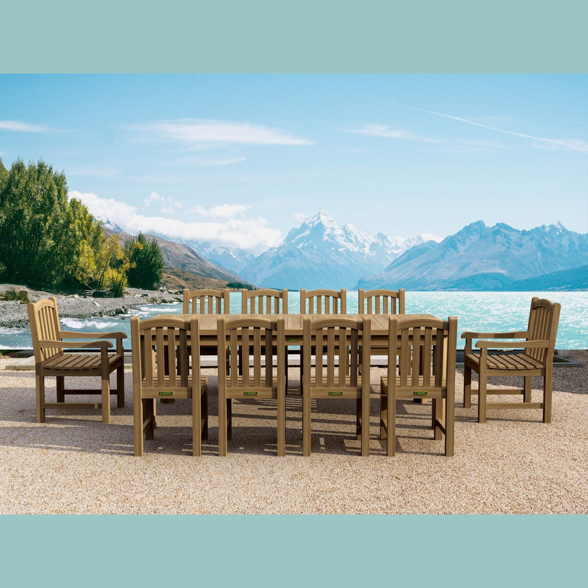 Wooden outdoor dining set with chairs and table in front of a scenic mountain and lake view.