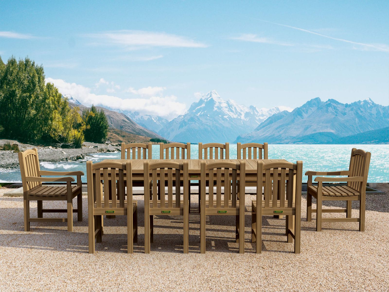 Wooden outdoor dining set with chairs and table in front of a scenic mountain and lake view.