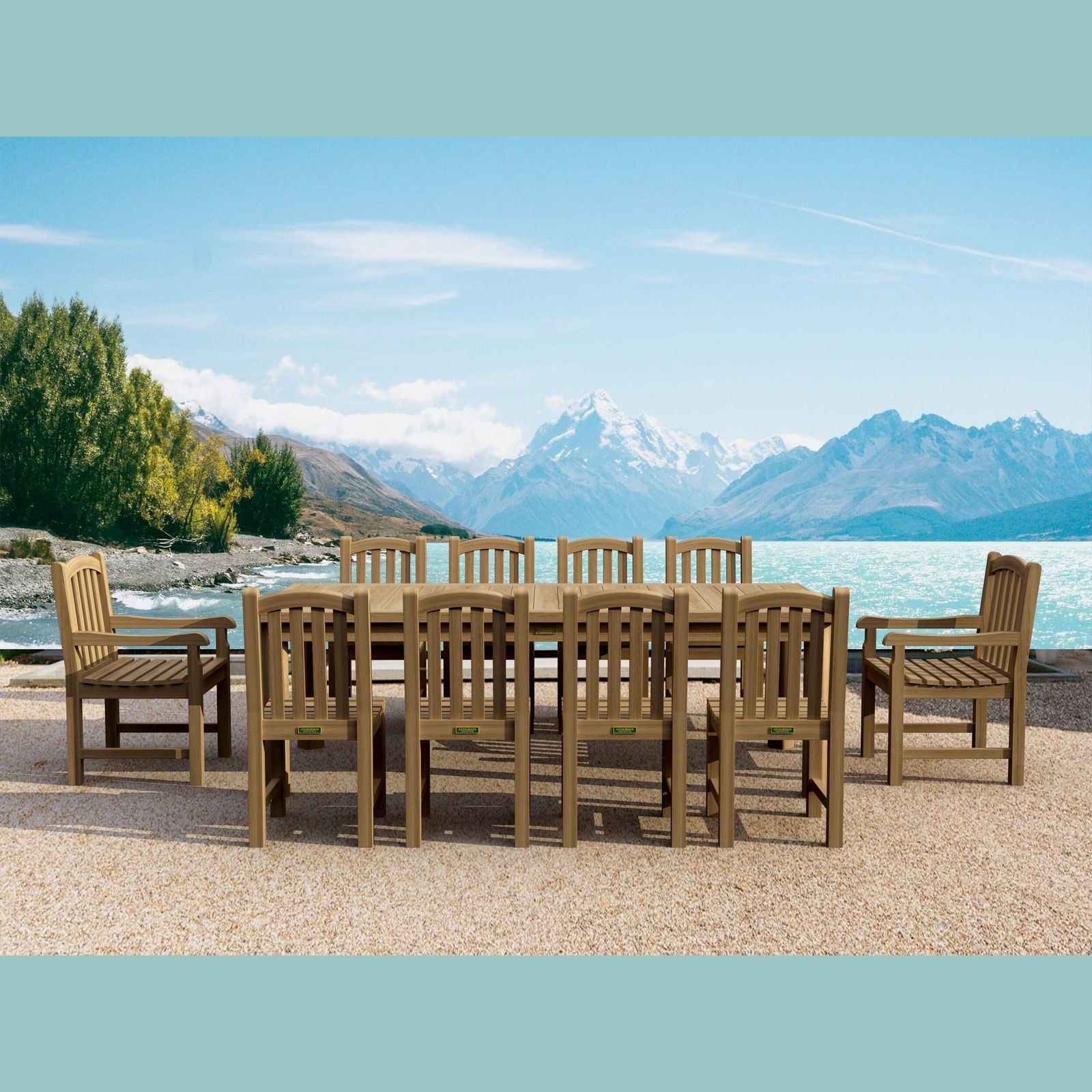 Wooden outdoor dining set with chairs and table in front of a scenic mountain and lake view.