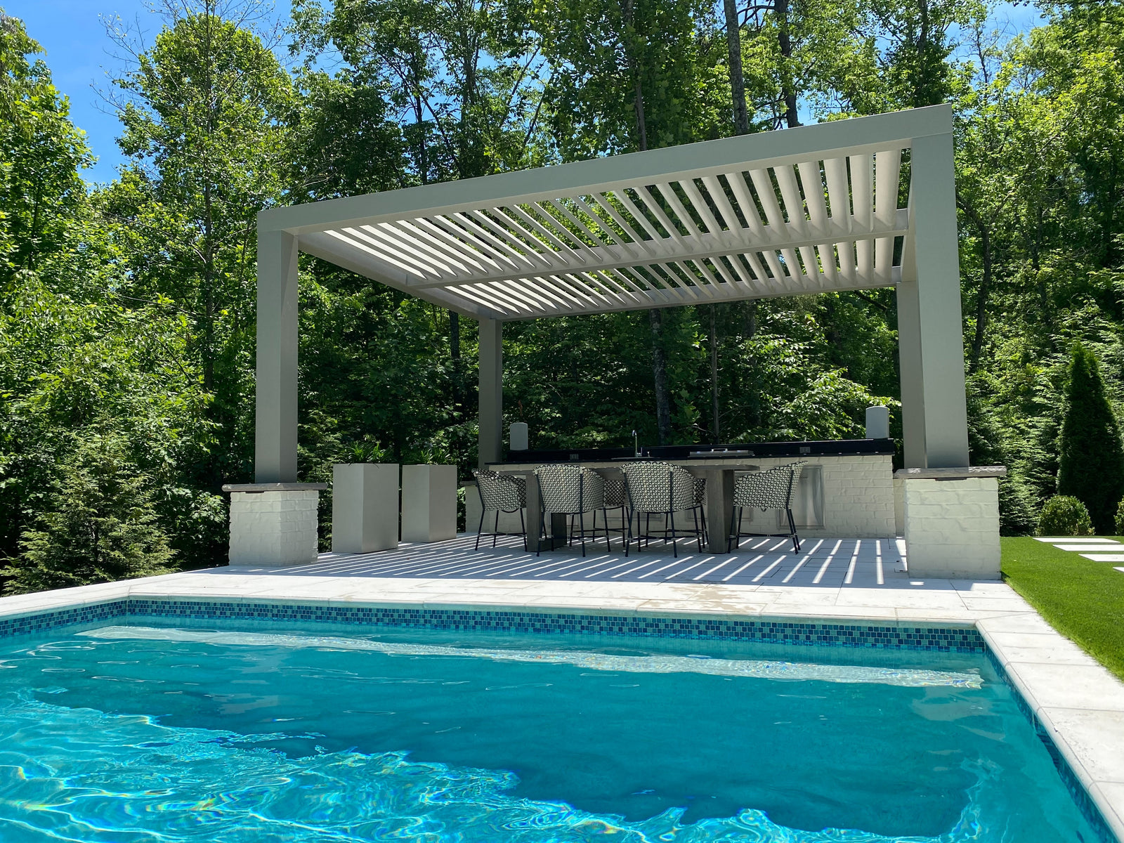 Solace Customizable Fiberglass Pergola with Square Columns and Fixed Louvered Rafters