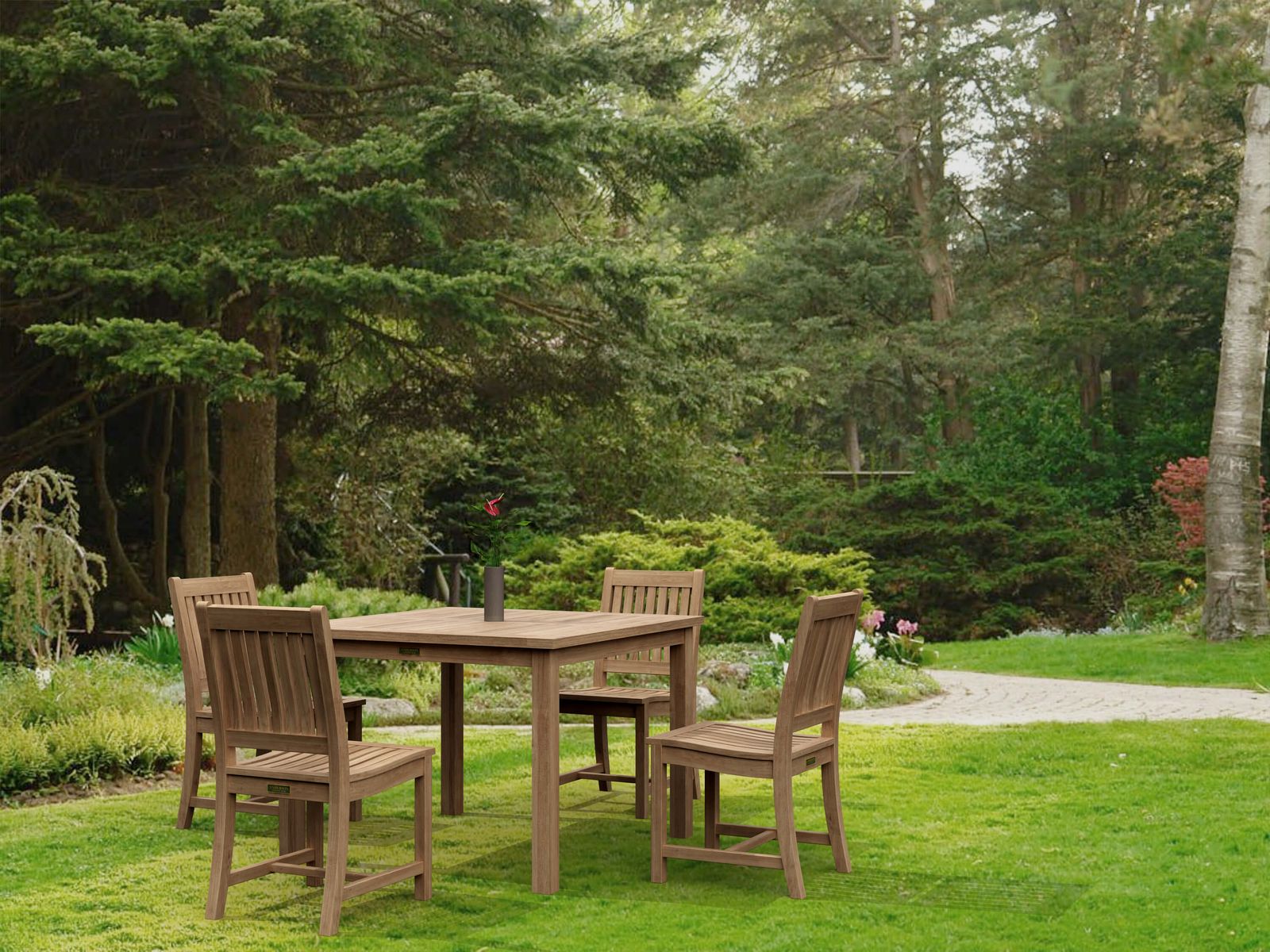 Wooden outdoor dining set in a garden with trees and flowers in the background