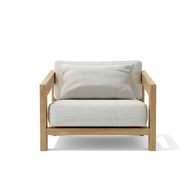 Modern armchair with light wooden frame and white cushion on a white background