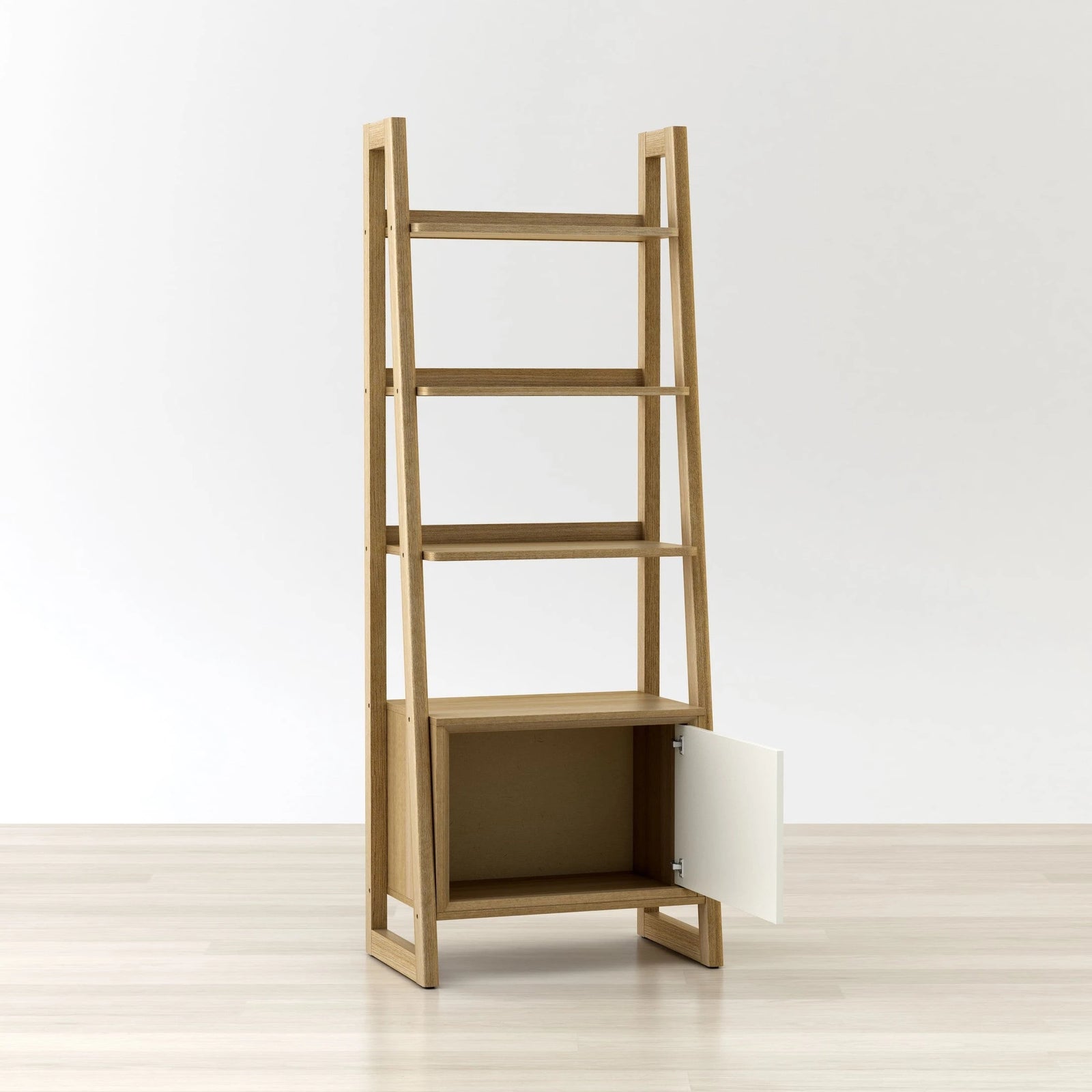 Wooden bookshelf with a white door on a light wooden floor and white wall background
