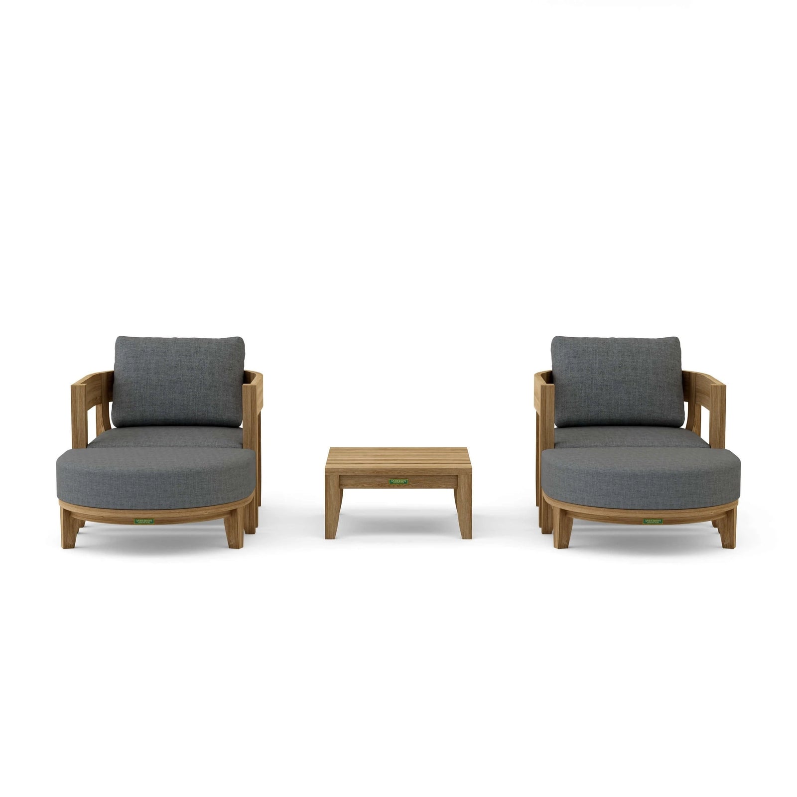 Two gray cushioned chairs with a small wooden table on a white background