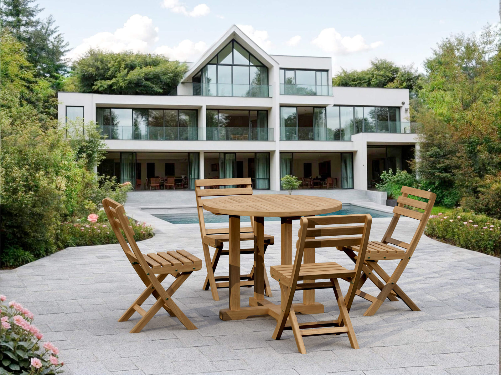Wooden outdoor dining set on a patio with a modern house in the background