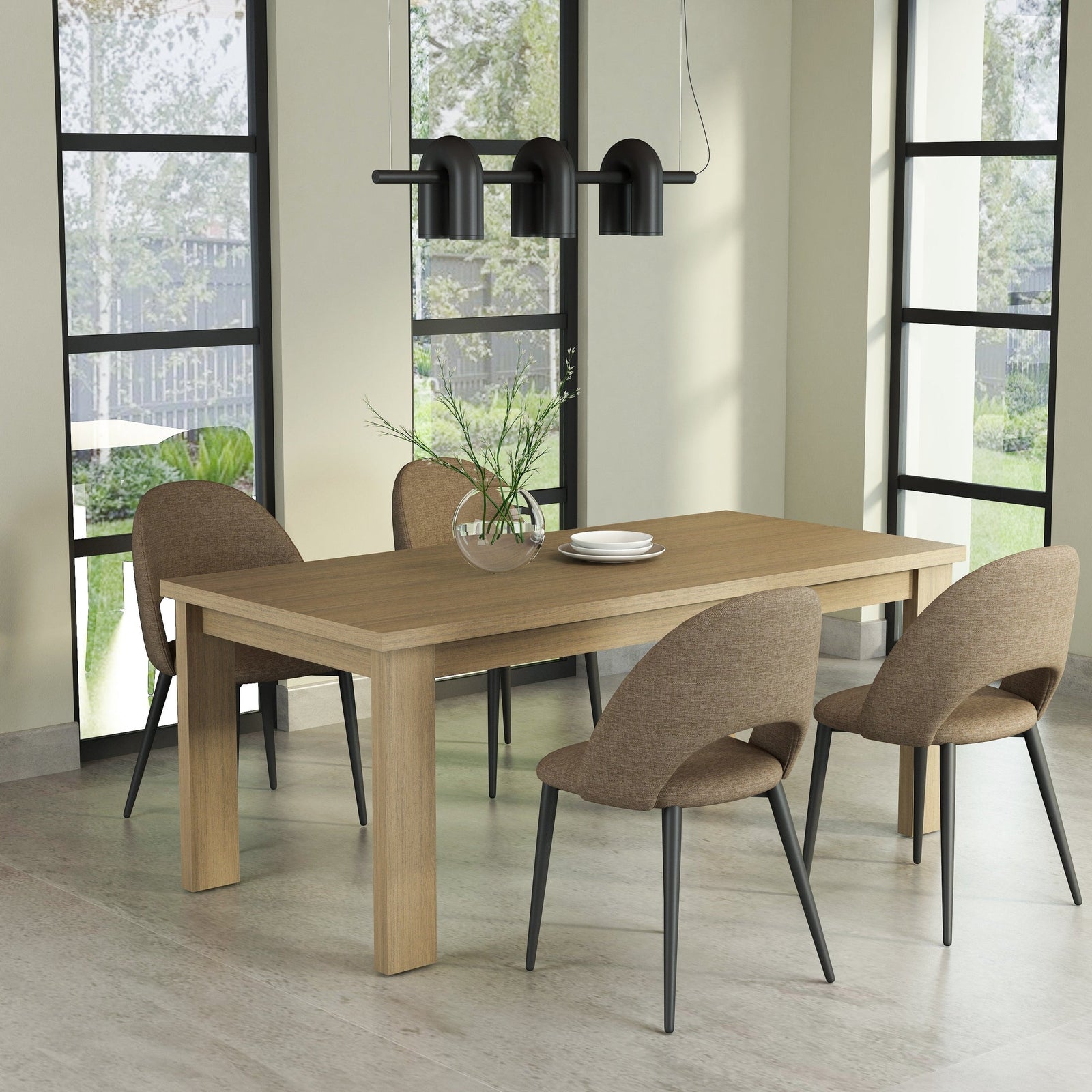 Dining room with a wooden table and chairs near large windows.