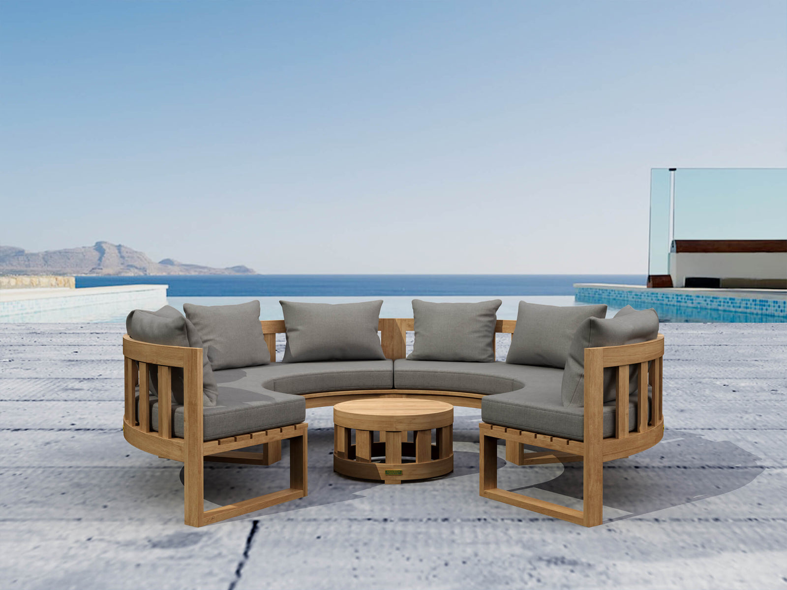 Outdoor patio furniture set with wooden frame and gray cushions by a pool and ocean view.