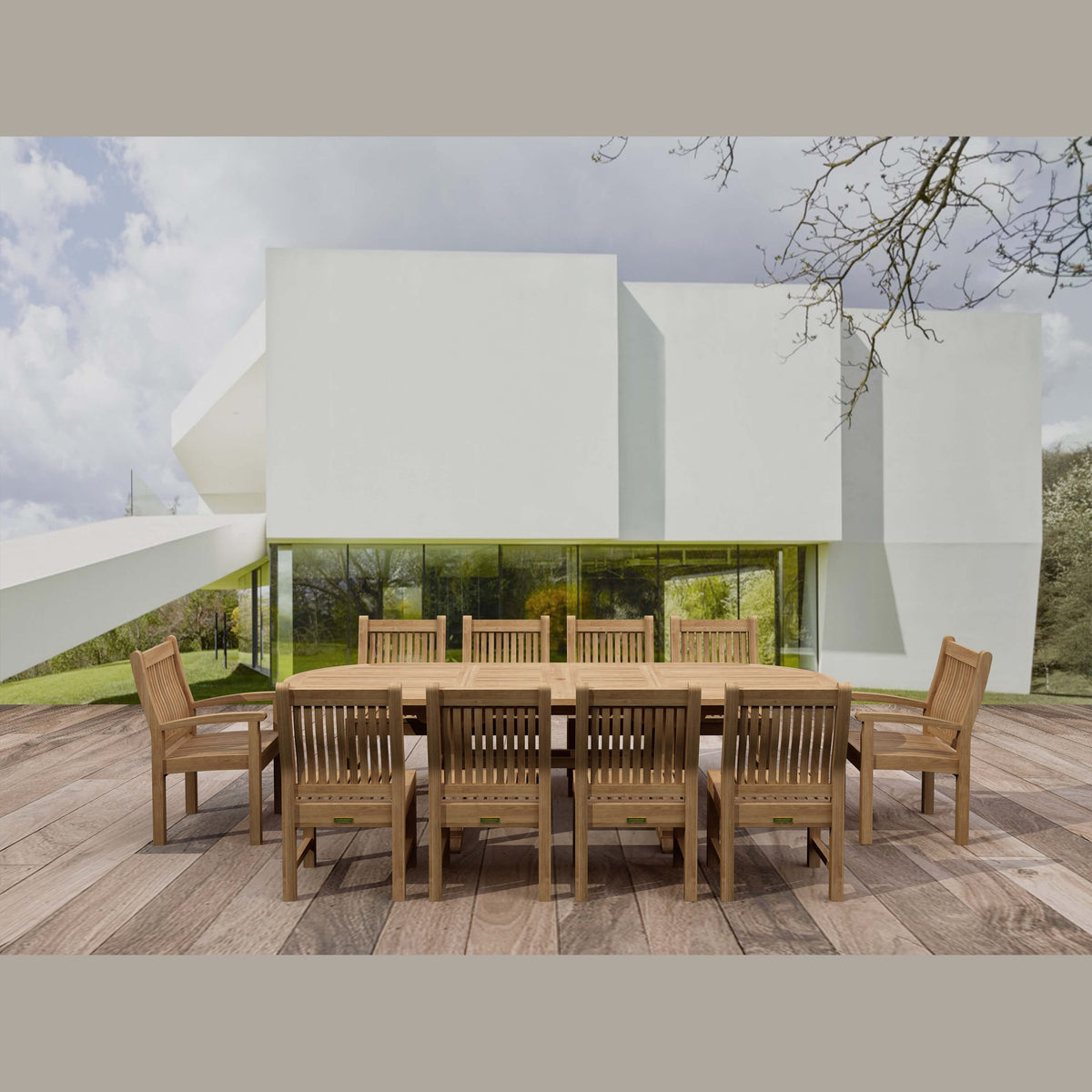 Wooden outdoor dining set on a deck with a modern building in the background