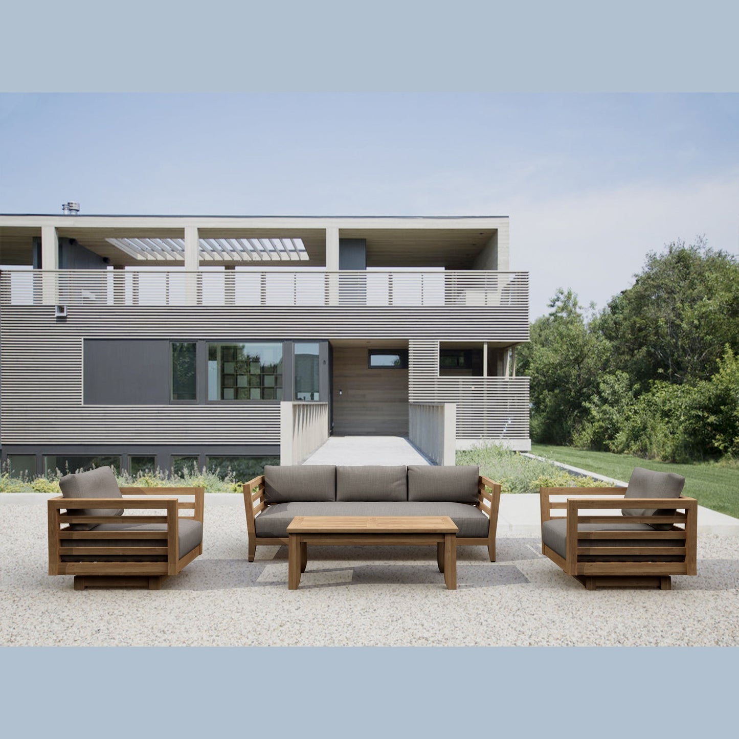 Modern outdoor furniture set in front of a contemporary house