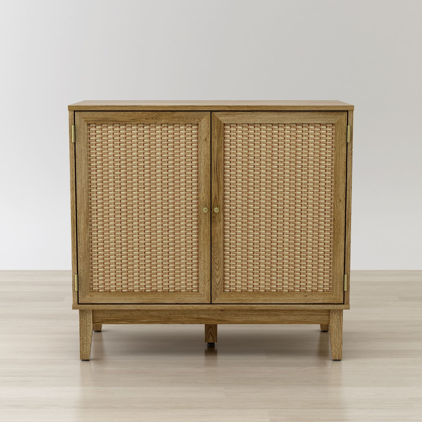 Wooden cabinet with wicker doors on a light wooden floor and white background