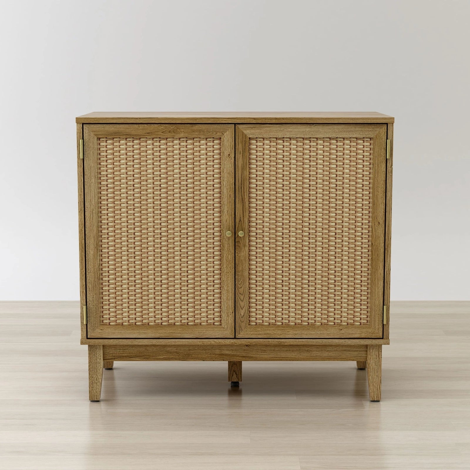 Wooden cabinet with wicker doors on a light wooden floor and white background