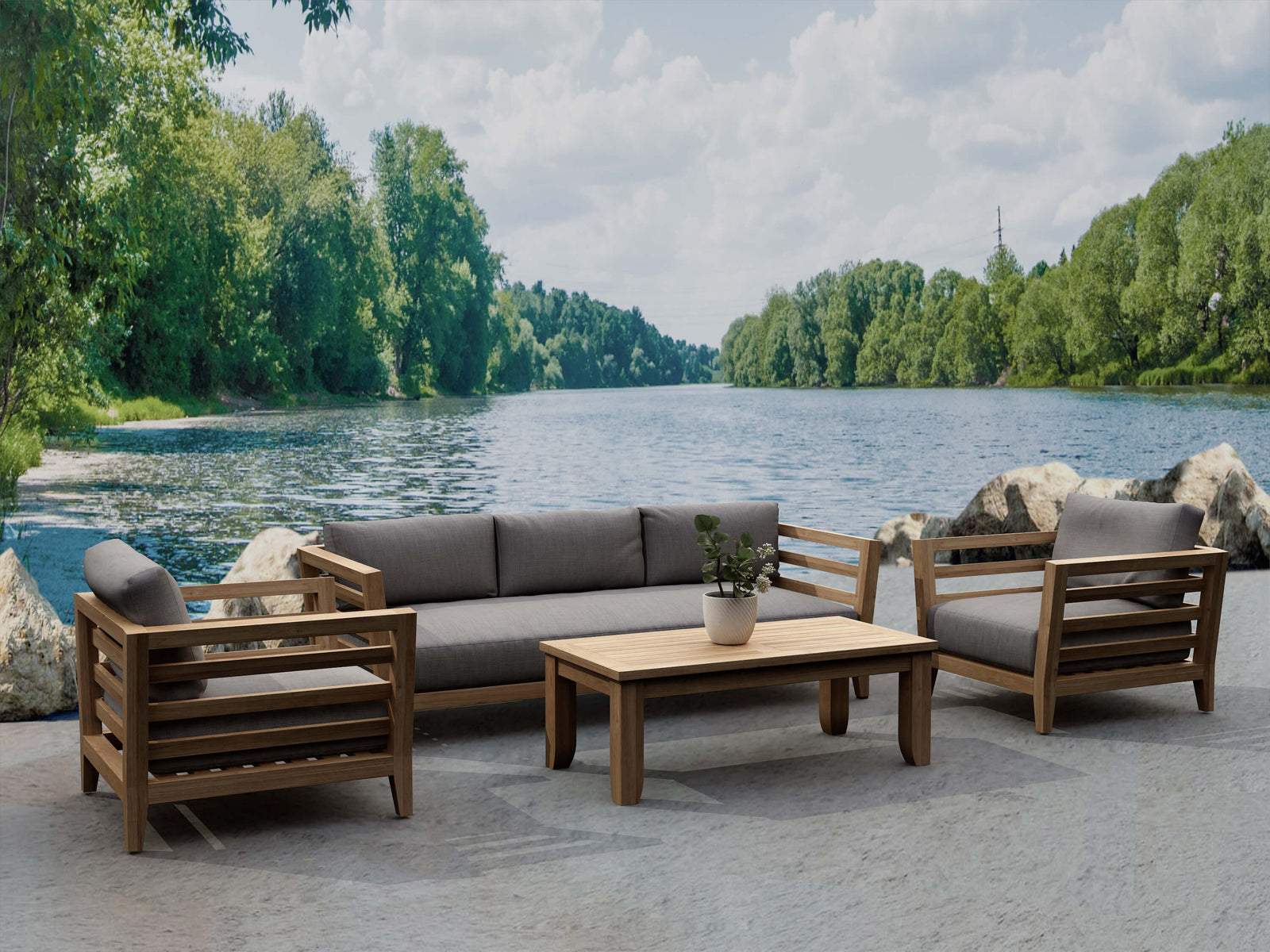 Outdoor furniture set with a sofa and chairs by a lake