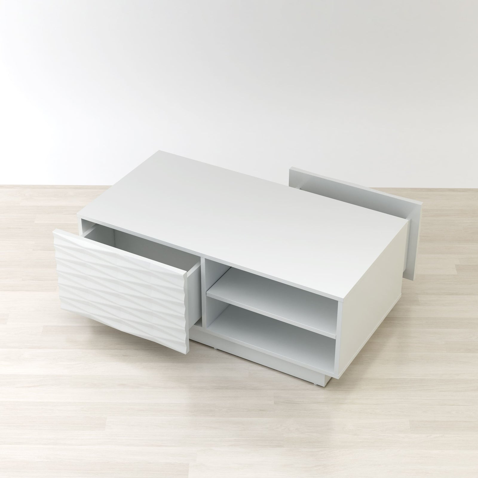 White office desk with a drawer on a light wooden floor.