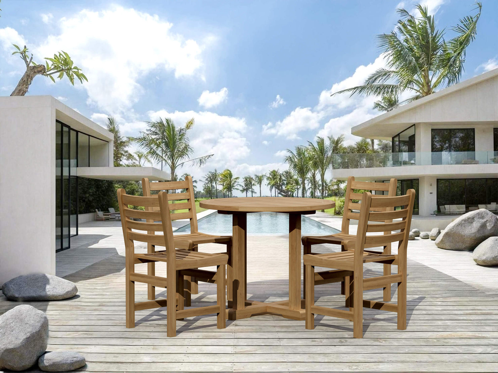 Wooden outdoor dining set on a deck with modern house and palm trees in the background