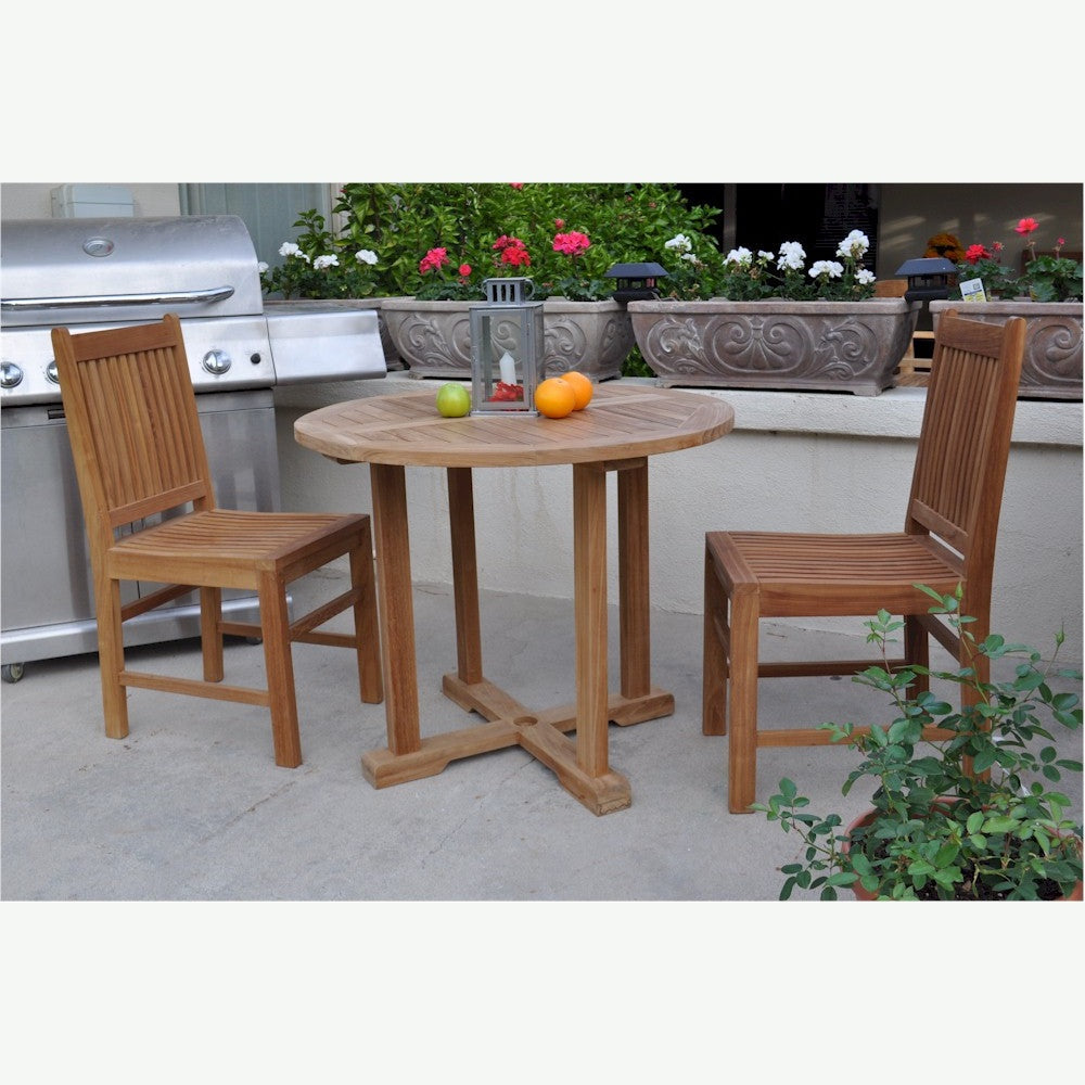 Wooden outdoor table with chairs on a patio