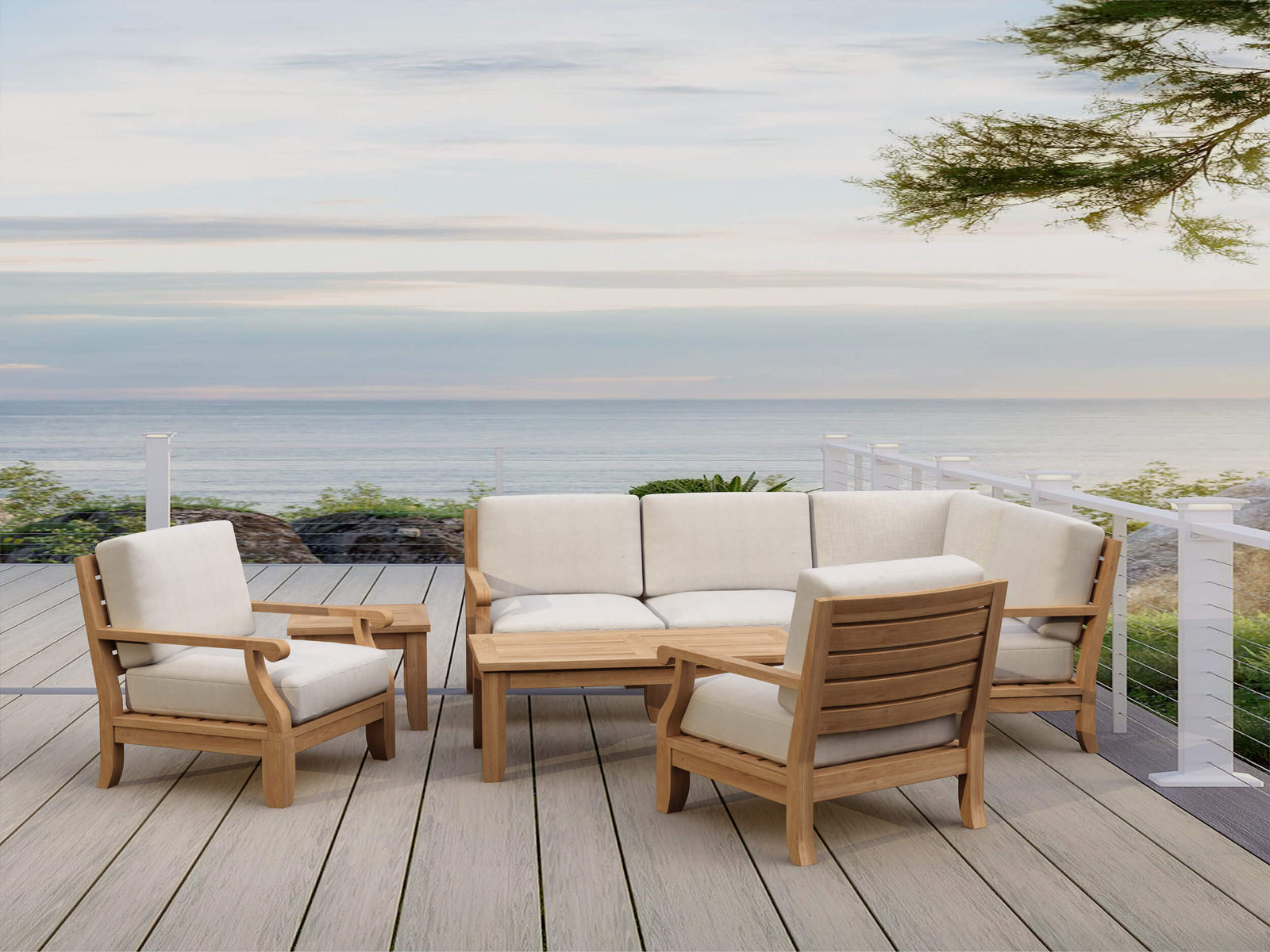 Outdoor furniture set on a deck with ocean view
