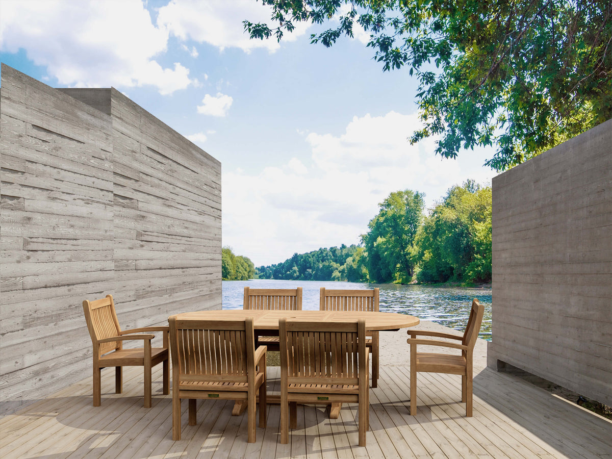 Wooden outdoor dining set with a view of a lake and trees.