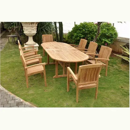 Wooden outdoor dining set with table and chairs on a grassy area