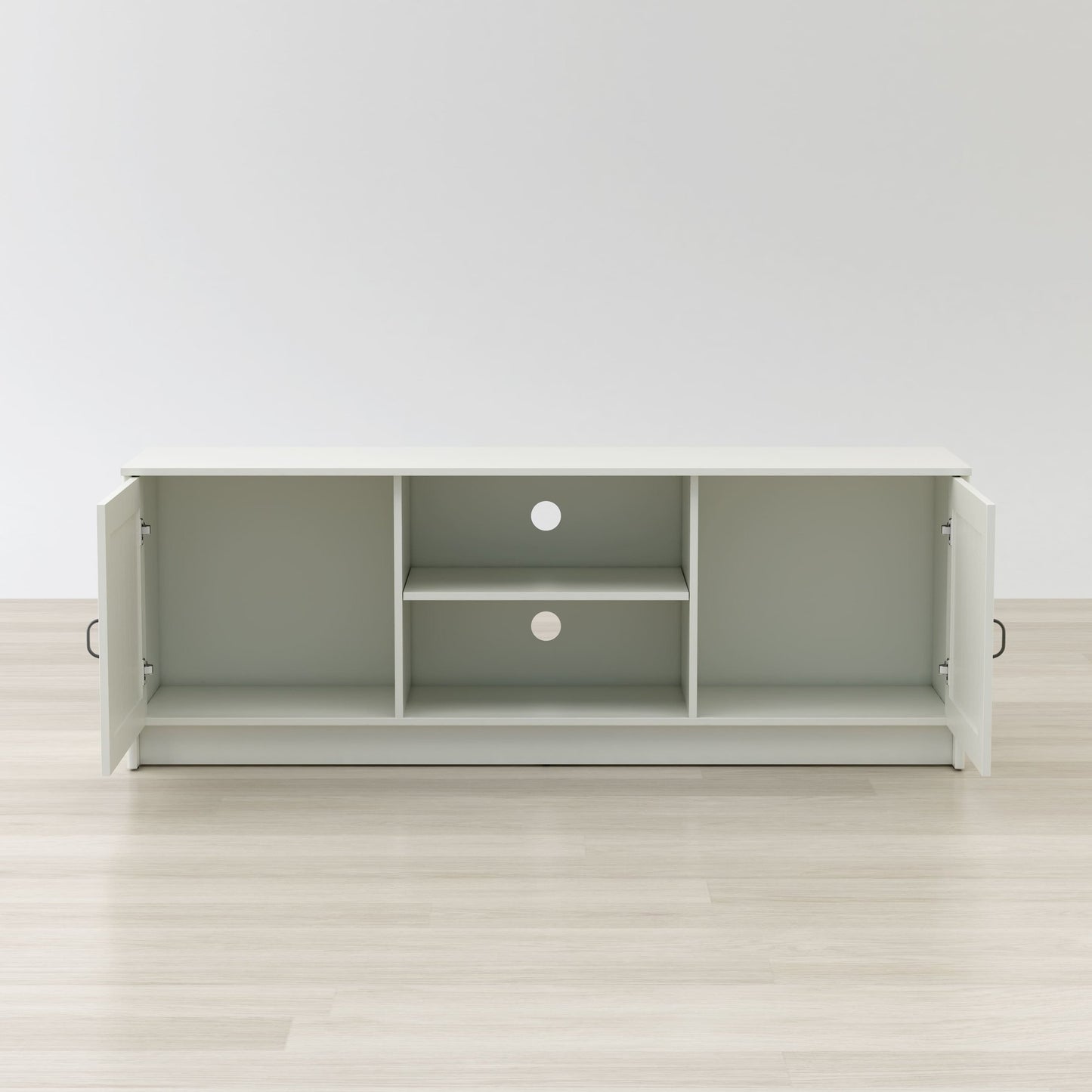 Gray entertainment console with open doors on a light wood floor and white wall background