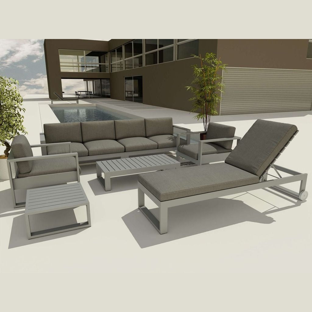 Outdoor furniture set with sofa, chairs, and table in a modern patio setting.