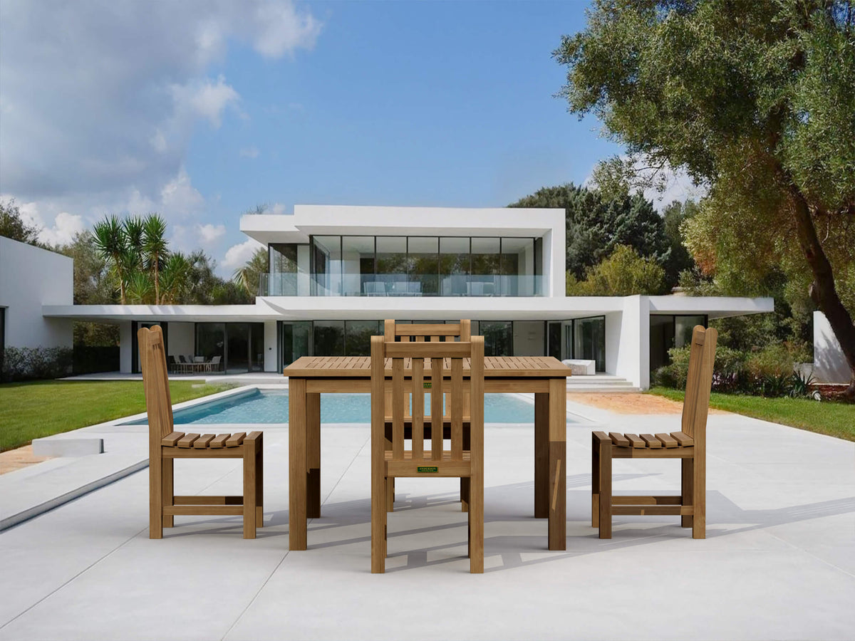 Wooden outdoor dining set with modern house and pool in the background