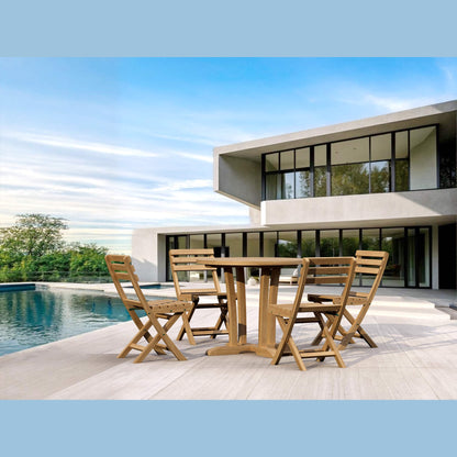Wooden outdoor dining set with table and chairs near a modern house and pool.