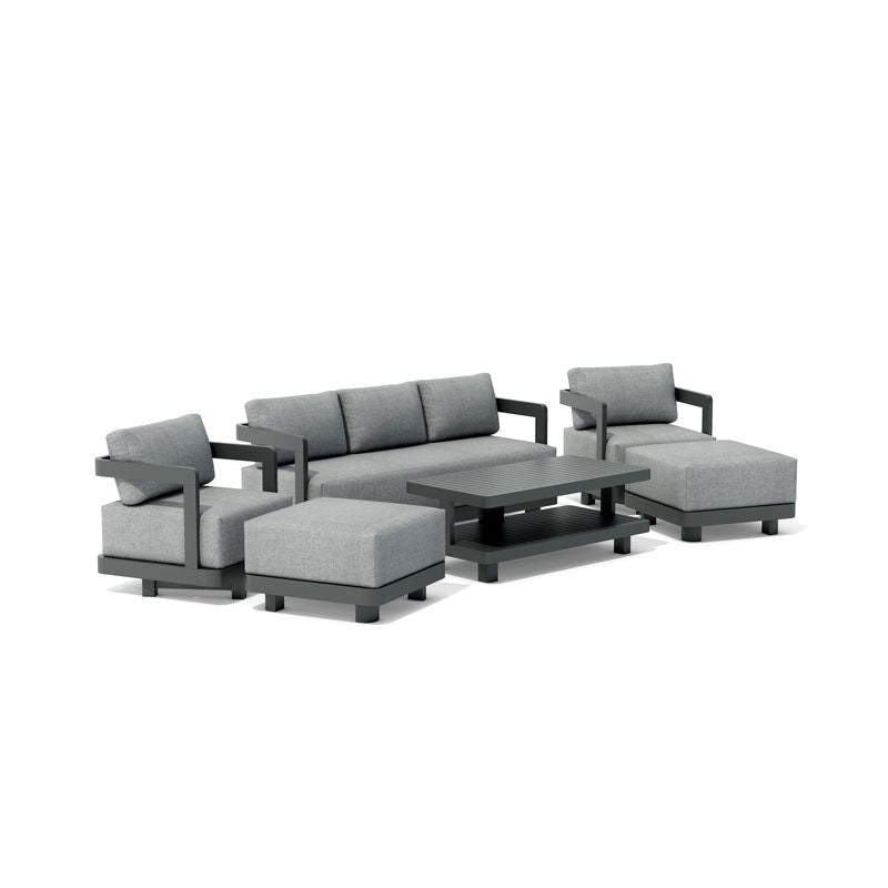 Gray outdoor sofa set with ottoman and table on a white background