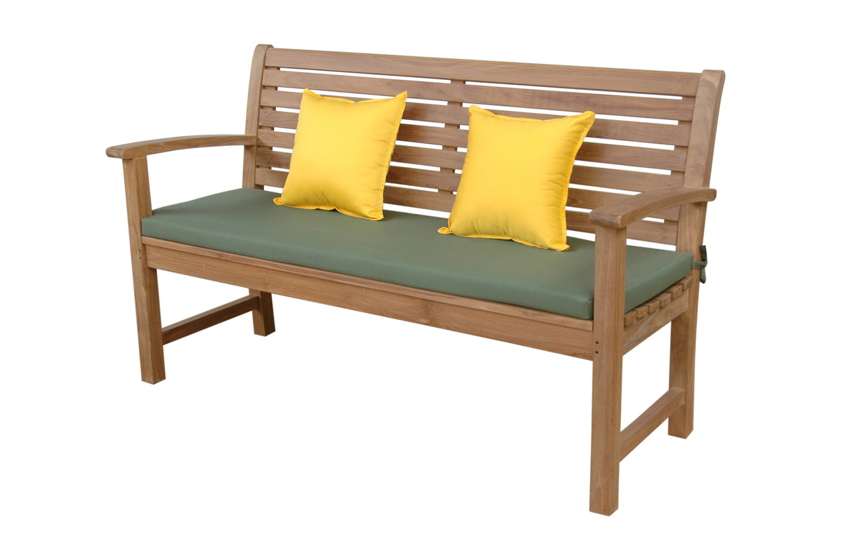 Wooden bench with green cushion and yellow pillows on a white background
