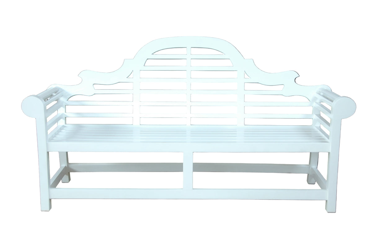 White metal bench with decorative backrest on a black background