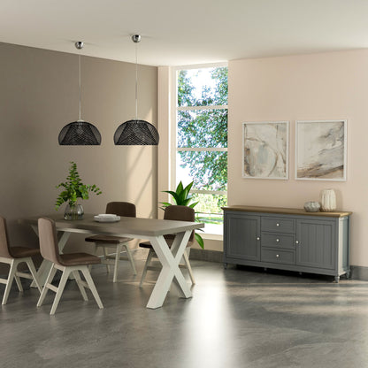Modern dining room with a table, chairs, and a sideboard.