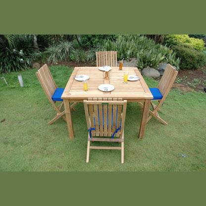 Wooden outdoor dining set with chairs and table on grass
