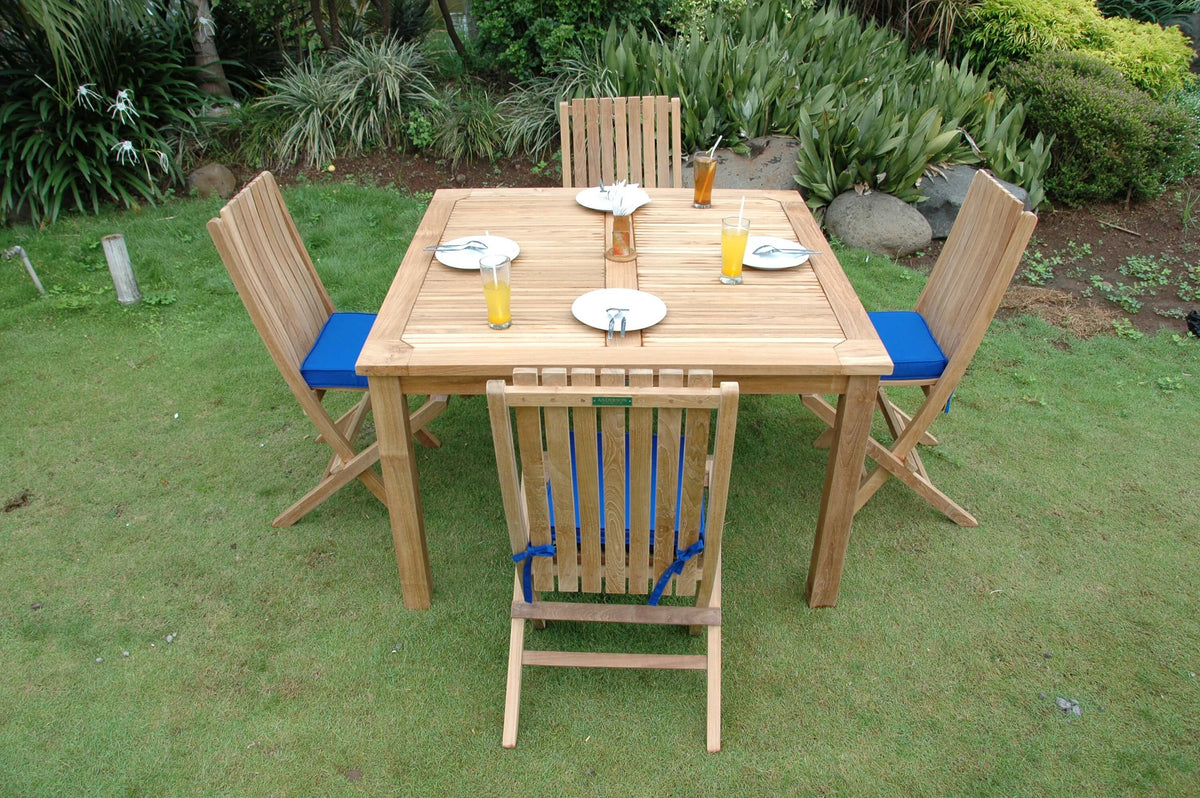 Wooden outdoor dining set with chairs and table on grass