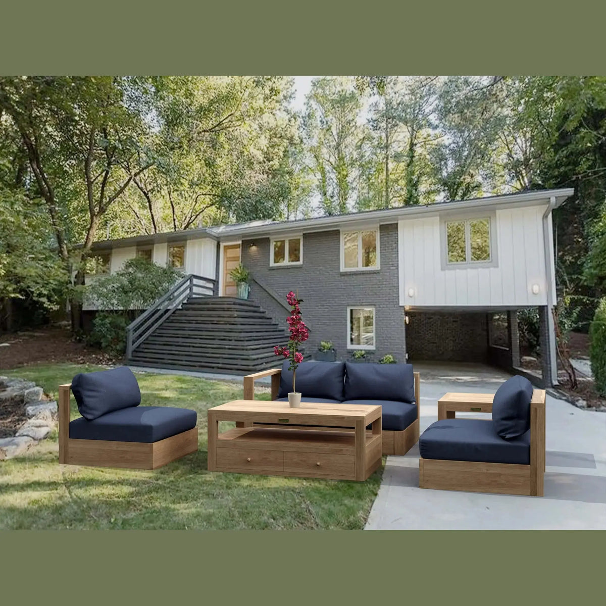 Outdoor patio set with wooden furniture and blue cushions in a backyard setting.