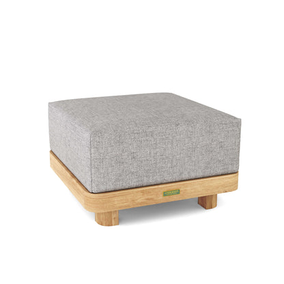 Gray upholstered ottoman with wooden legs on a white background