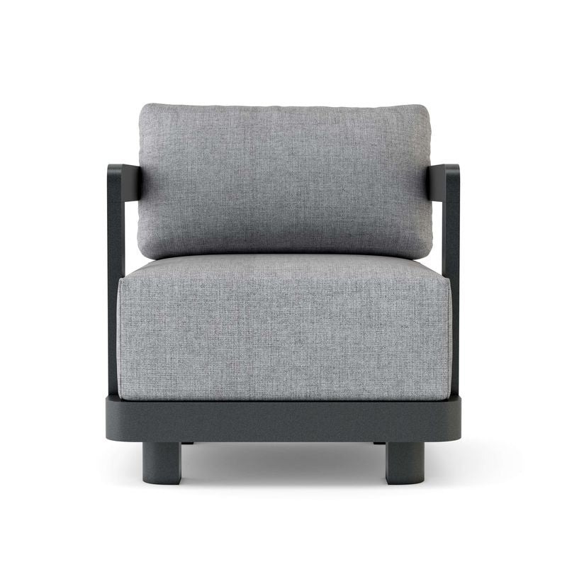 Gray cushioned chair with black frame on a white background