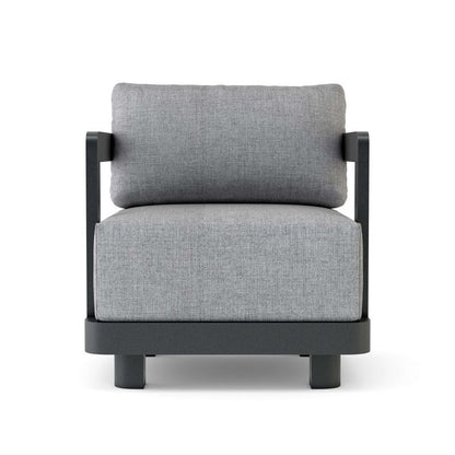 Gray cushioned chair with black frame on a white background