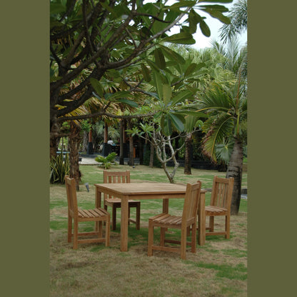 Wooden outdoor dining set with table and chairs in a garden setting