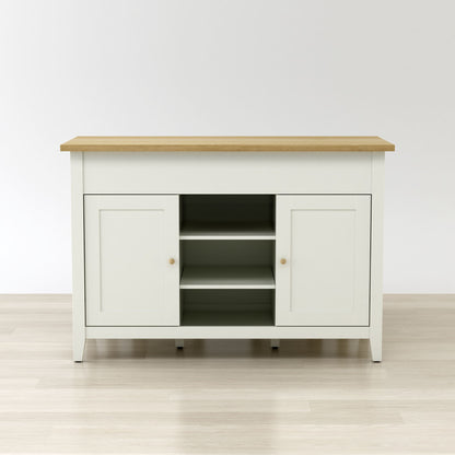 White sideboard with wooden top on a light wood floor