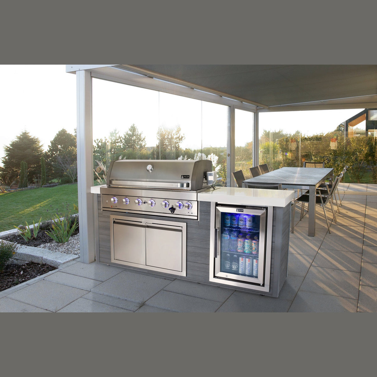 Mont Alpi MA805-AWSS artwood island stainless steel on covered patio lifestyle setting