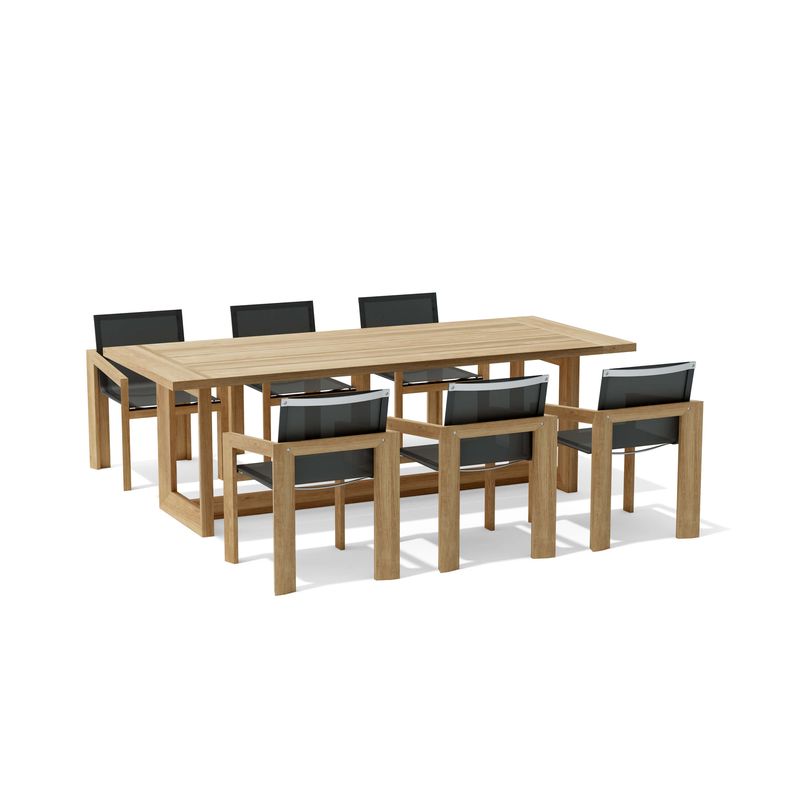 Wooden dining table with six matching chairs on a white background