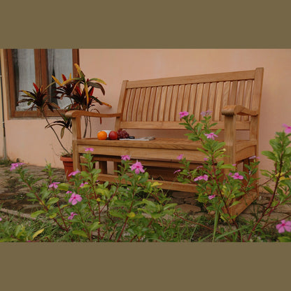 Wooden bench in a garden with flowers and fruits on it