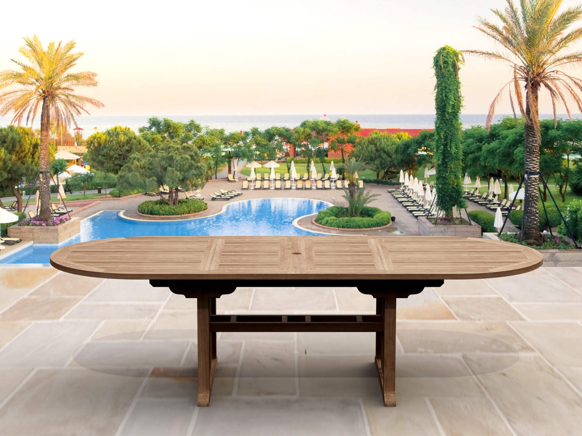 Wooden outdoor table with a scenic pool and palm tree background