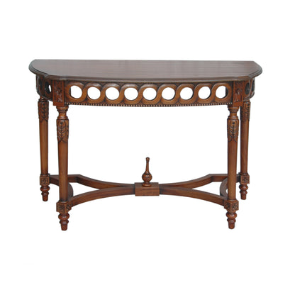 Wooden console table with decorative design on a white background
