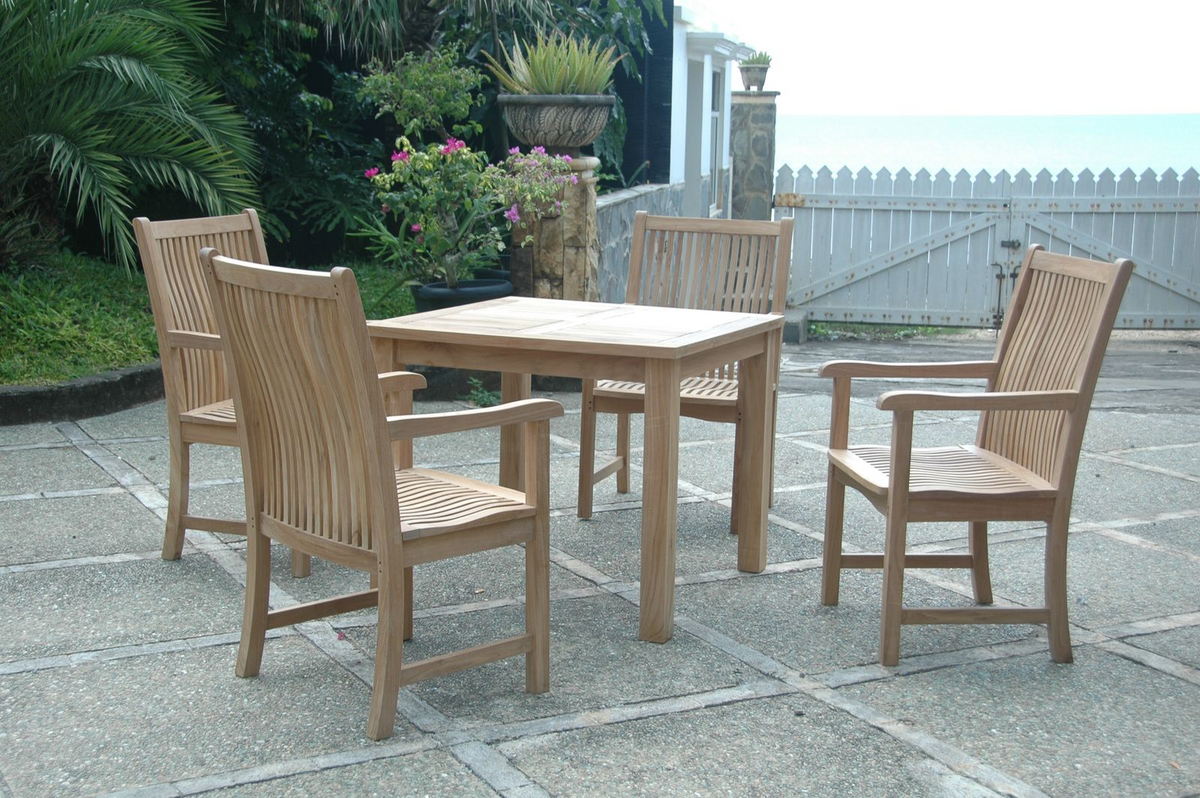 Wooden outdoor dining set with table and chairs on a patio